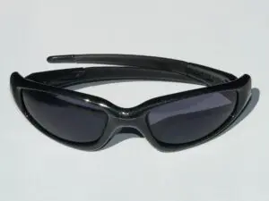 Black cateye plastic frame with grey lenses at Maple Grove Eye Doctors at Pearle Vision