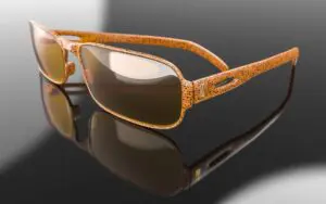 Orange with brown dots rectangle frame with brownish lenses at Maple Grove Eye Doctors at Pearle Vision