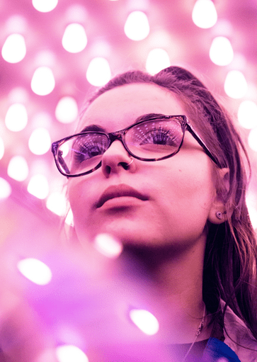 pink lights girl in glasses Maple Grove