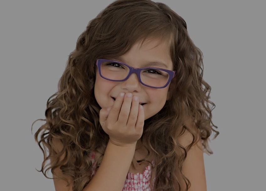 Purple glasses girl laughing Maple Grove