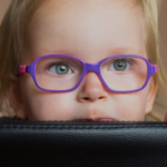 Little Girl with Glasses Maple Grove Eye Doctors at Pearle Vision