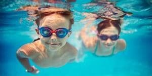 Kids with swim goggles Maple Grove Eye Doctors at Pearle Vision