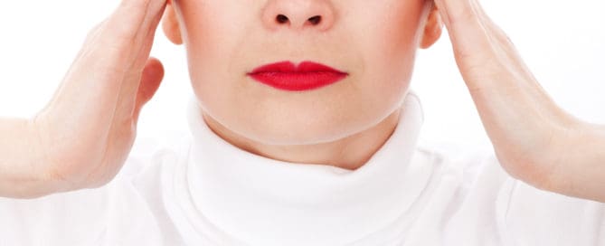 woman with headache. Maple Grove Eye Doctors at Pearle Vision