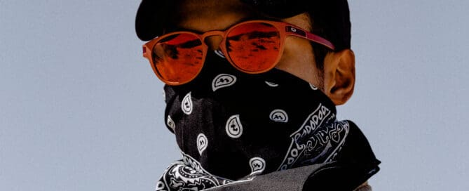 Man wearing mask with sunglasses Maple Grove Eye Doctors at Pearle Vision